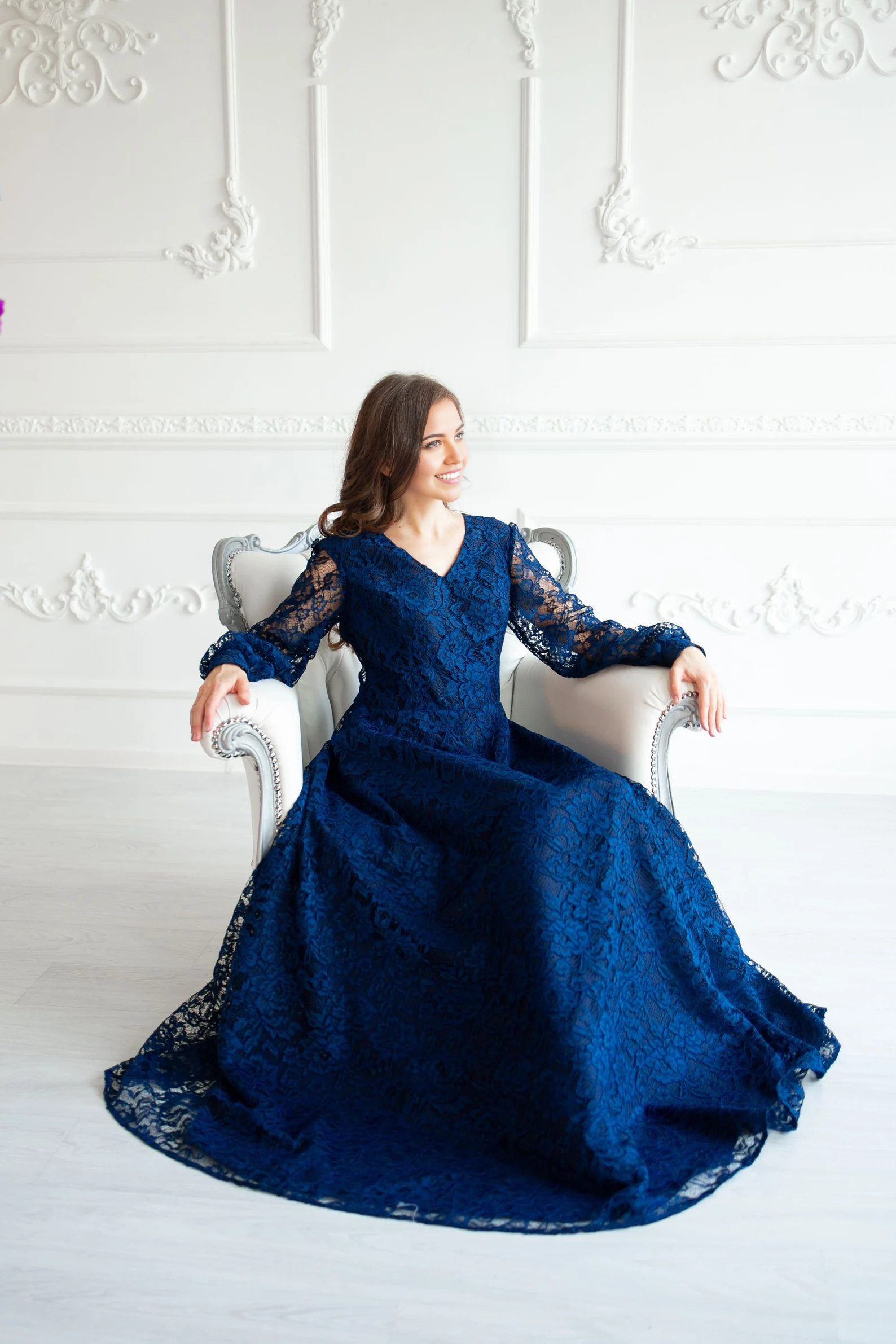 Close-up of the lace detail on the V-neck formal dress.