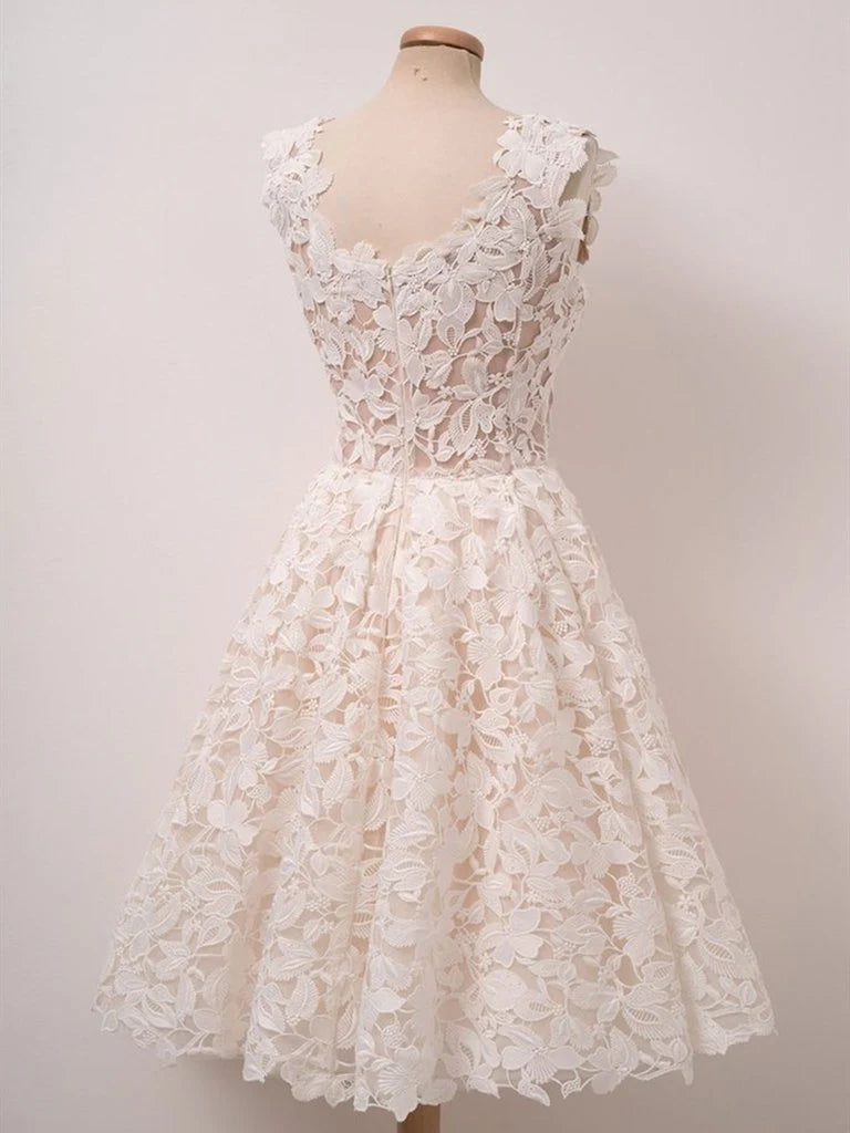 Close-up of the lace detail and V-neckline on the A-line short dress.