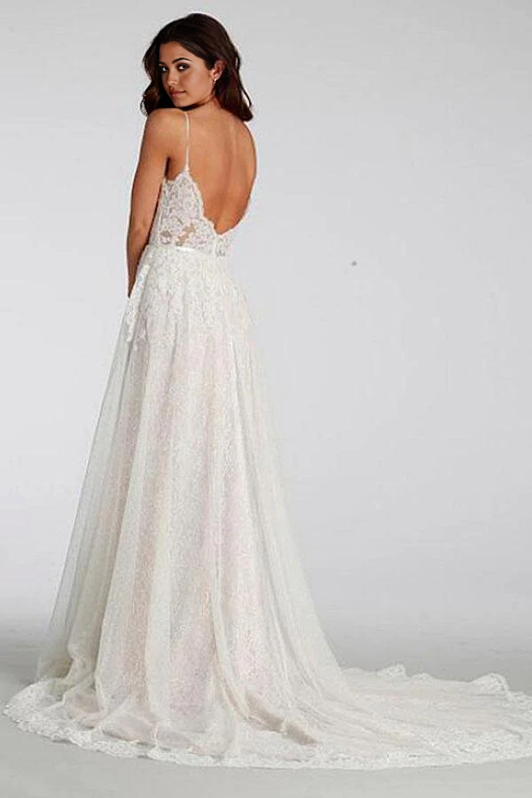 Side view of a long beach wedding dress featuring delicate lace details.