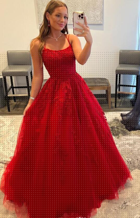 Red A-line lace prom dress with spaghetti straps and V-neck.