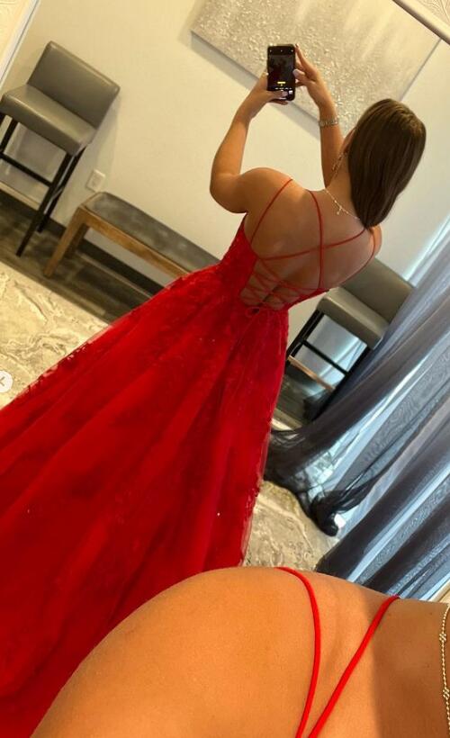 Elegant red formal dress featuring lace details and an A-line silhouette.