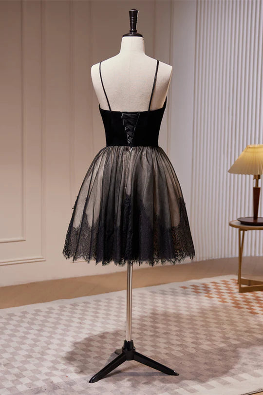 Back view of A-line tulle homecoming dress with pleated straps.