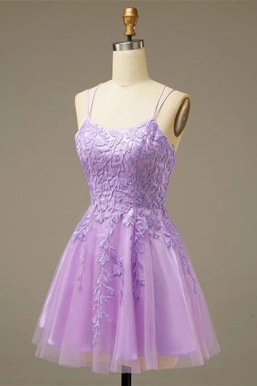 Elegant A-line mini homecoming dress with V-neckline and applique details.
