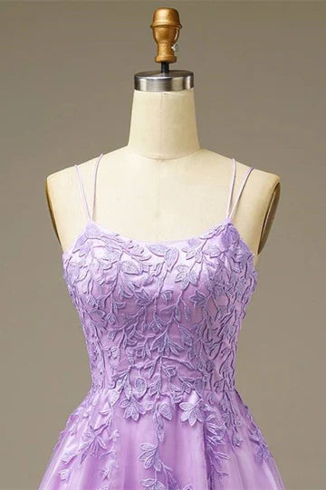 Back view of the A-line mini homecoming dress featuring a lace-up closure.