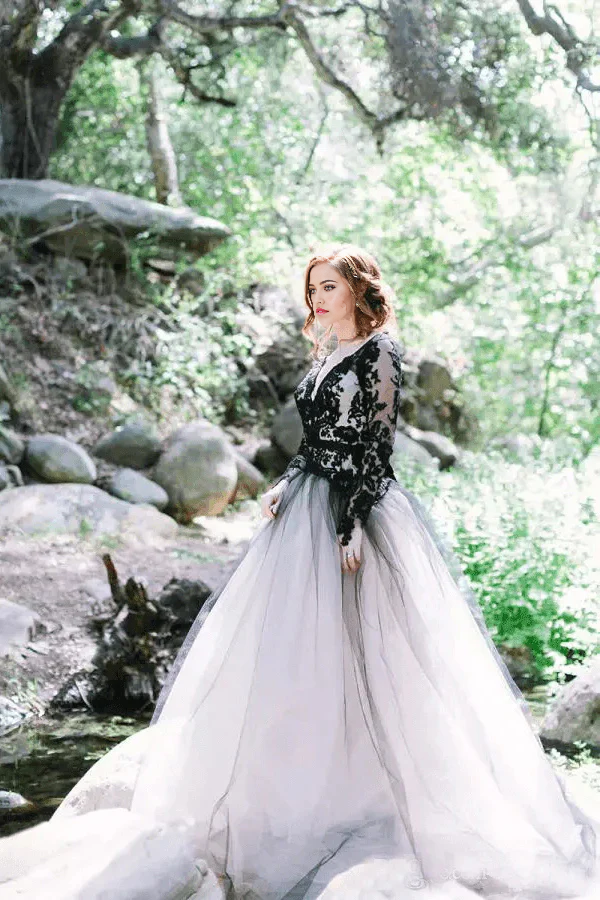 Elegant A-line V-neck long sleeve black lace wedding dress.