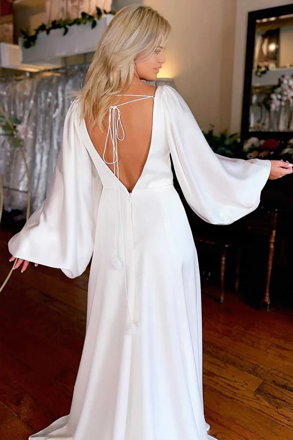 Back view of the ivory A-line wedding gown.
