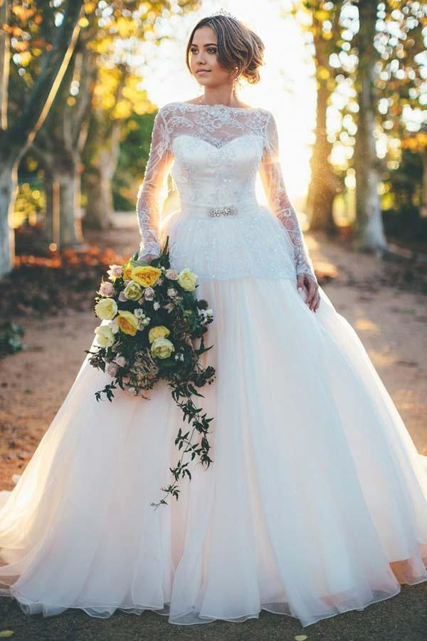 Elegant A-line V-neck long sleeve organza wedding dress with beading and lace details.