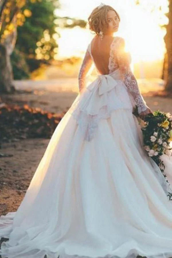 Back view of the A-line organza wedding dress featuring long sleeves and delicate lace.
