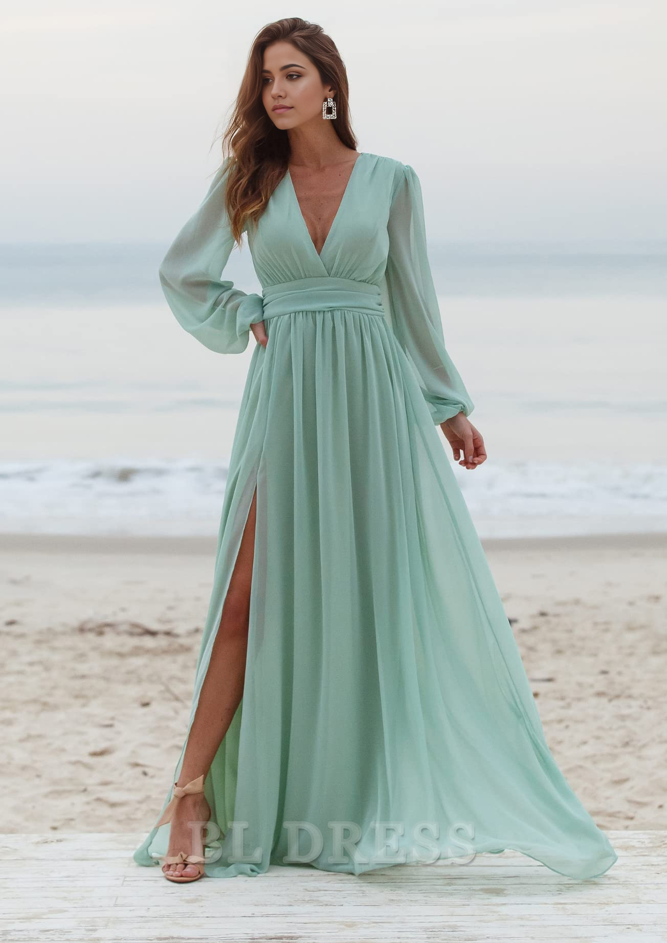 Model wearing the A-line V-neck long sleeve formal dress, showcasing the slit.