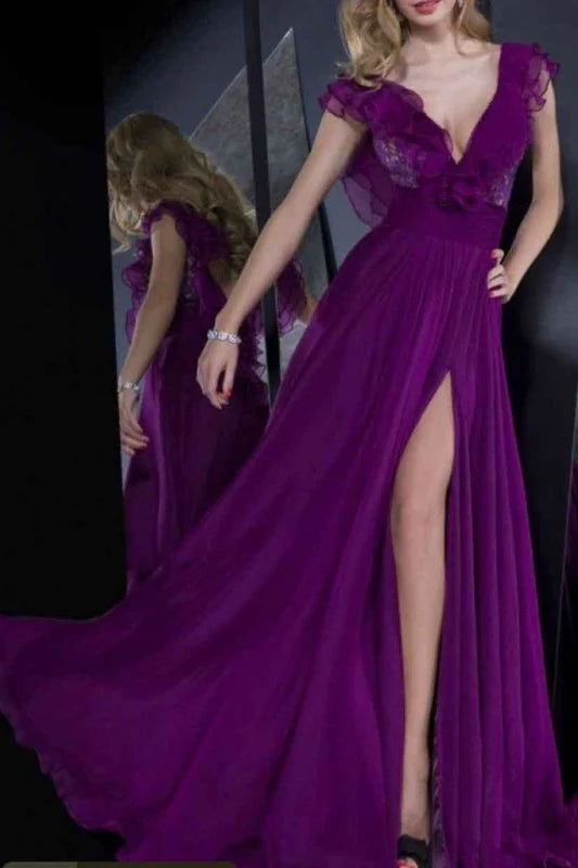 Woman wearing an elegant A-line long sleeve V-neck chiffon prom dress with ruffles.