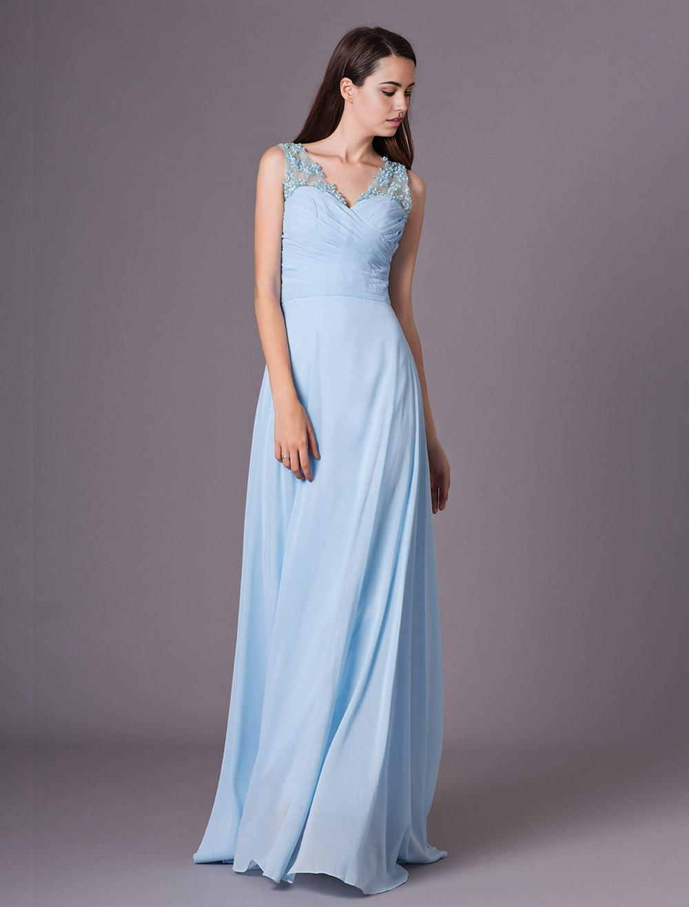 Close-up of the floral embellishment on the chiffon dress.