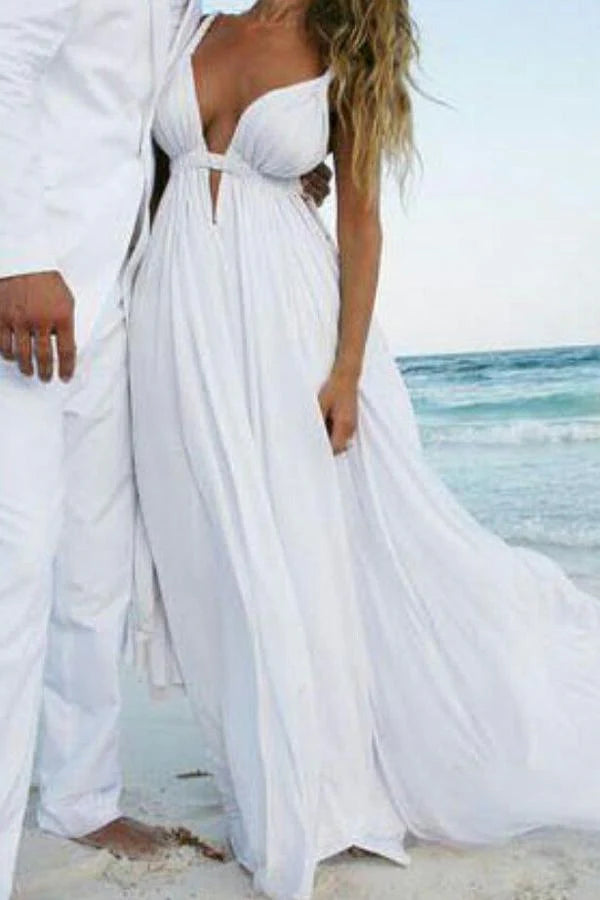 Elegant A-line chiffon wedding dress with open back and V-neck.