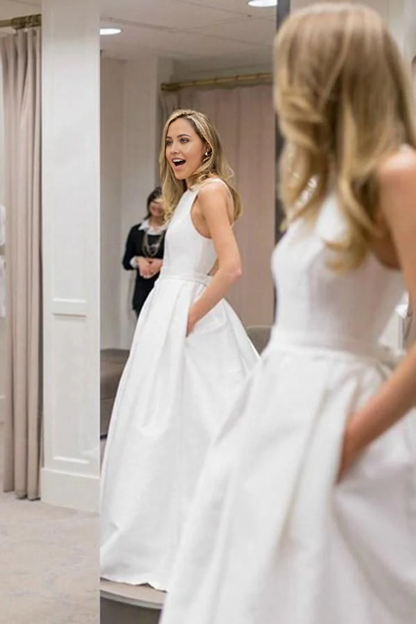 Elegant A-line wedding dress with a V-neck and open back.