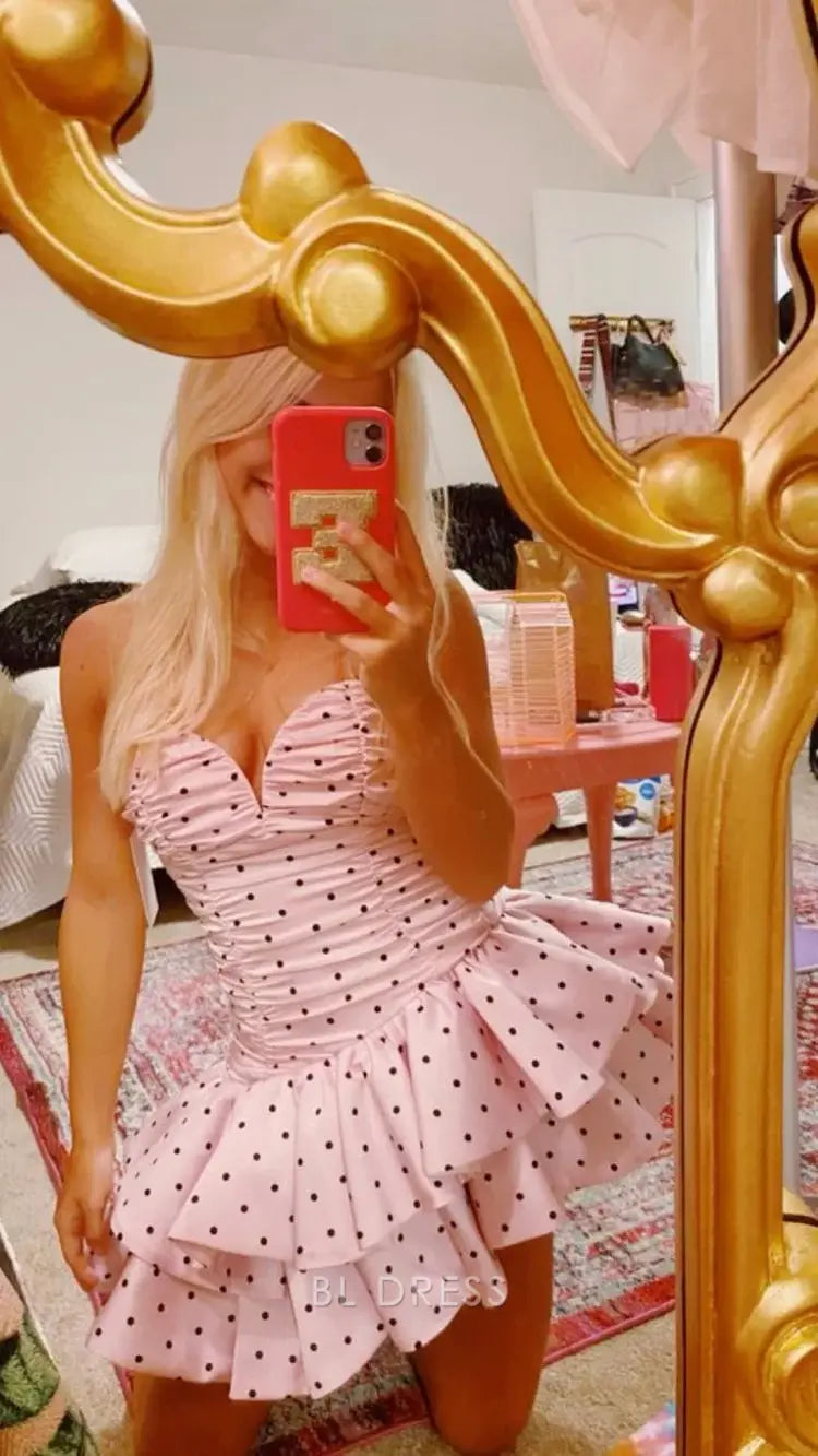 Model showcasing the pink dot A-line V-neck short dress.