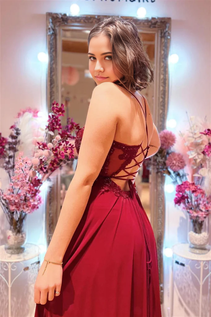 Back view of the elegant burgundy A-line prom dress, showcasing its long silhouette.