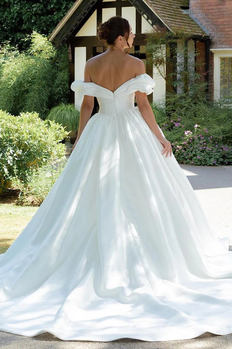 Back view of the elegant long wedding gown.