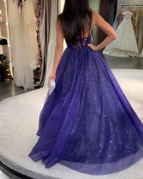 Back view of the royal blue A-line evening dress showing cross straps.