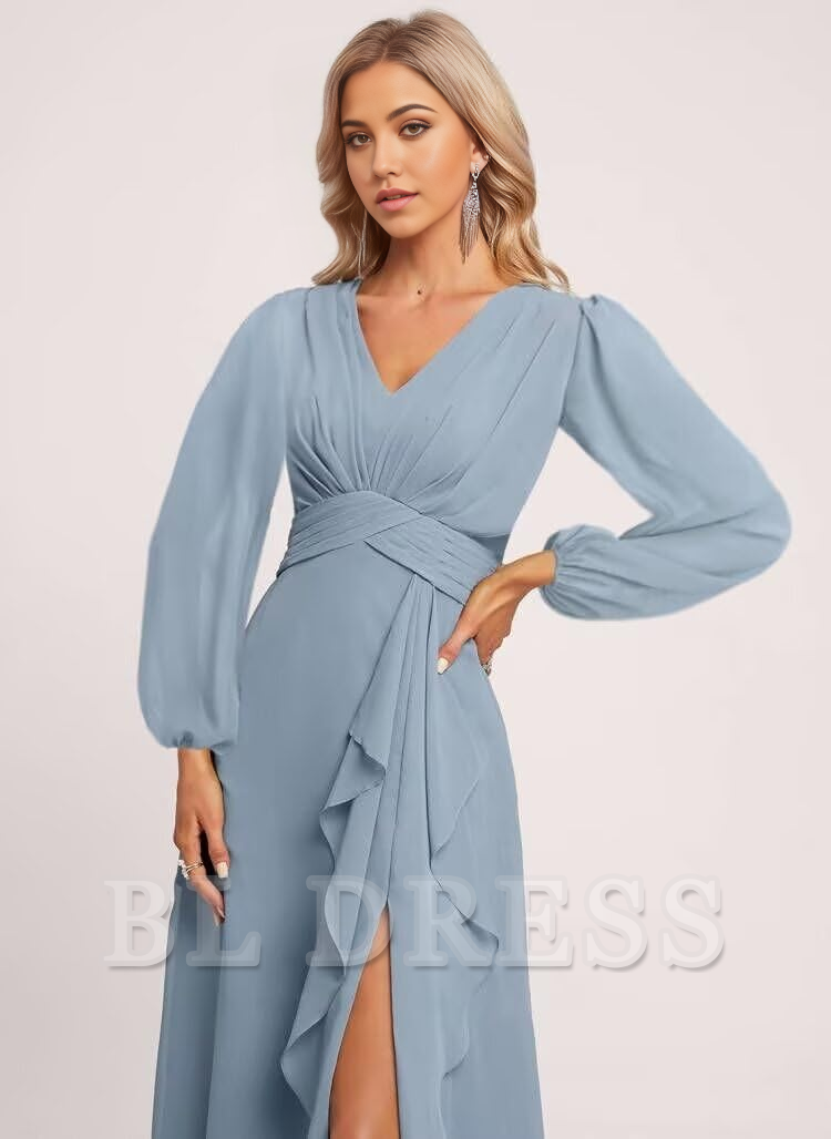 Woman wearing an elegant A-line V-neck long sleeve formal dress with ruffles and a high slit.