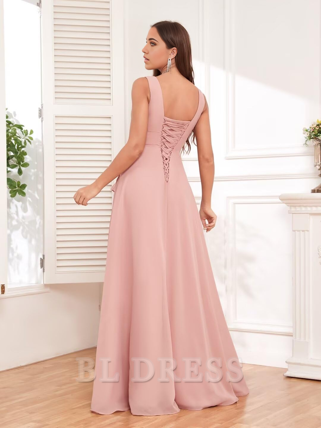 Back view of the pleated chiffon formal gown.