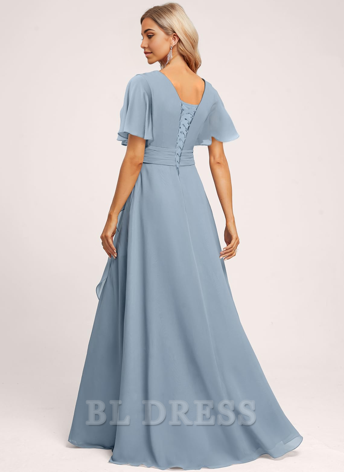 Side profile of the A-line V-neck maxi dress, highlighting the ruffle sleeve and slit.