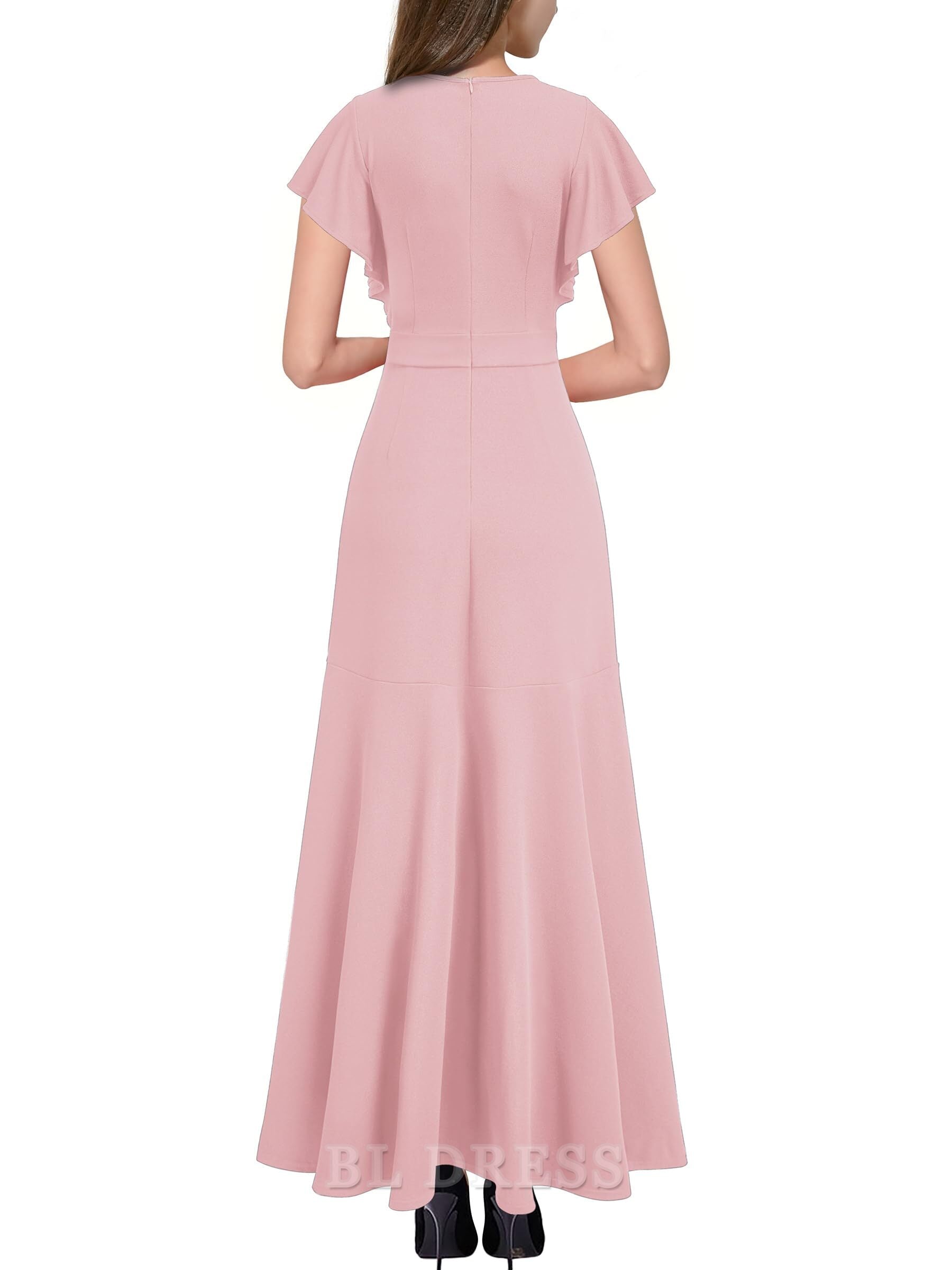 Woman in a flowing A-line V-neck evening gown.