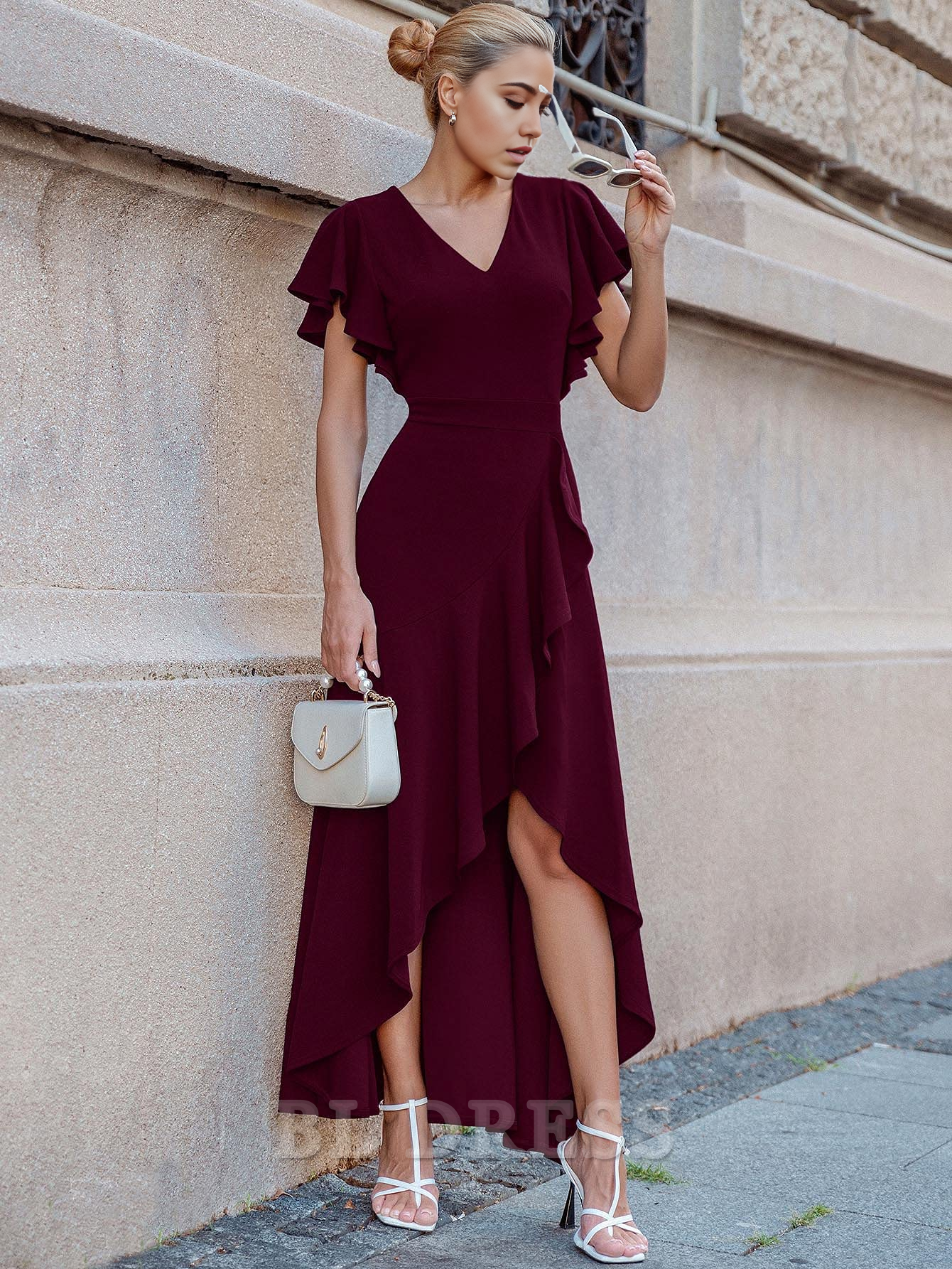 Elegant A-line V-neck formal dress with ruffle and split detail.