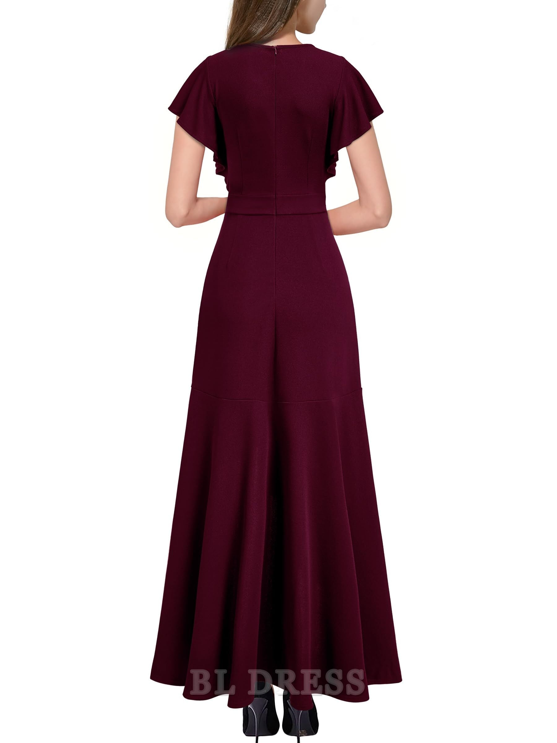 Side view of a woman wearing a V-neck prom dress.