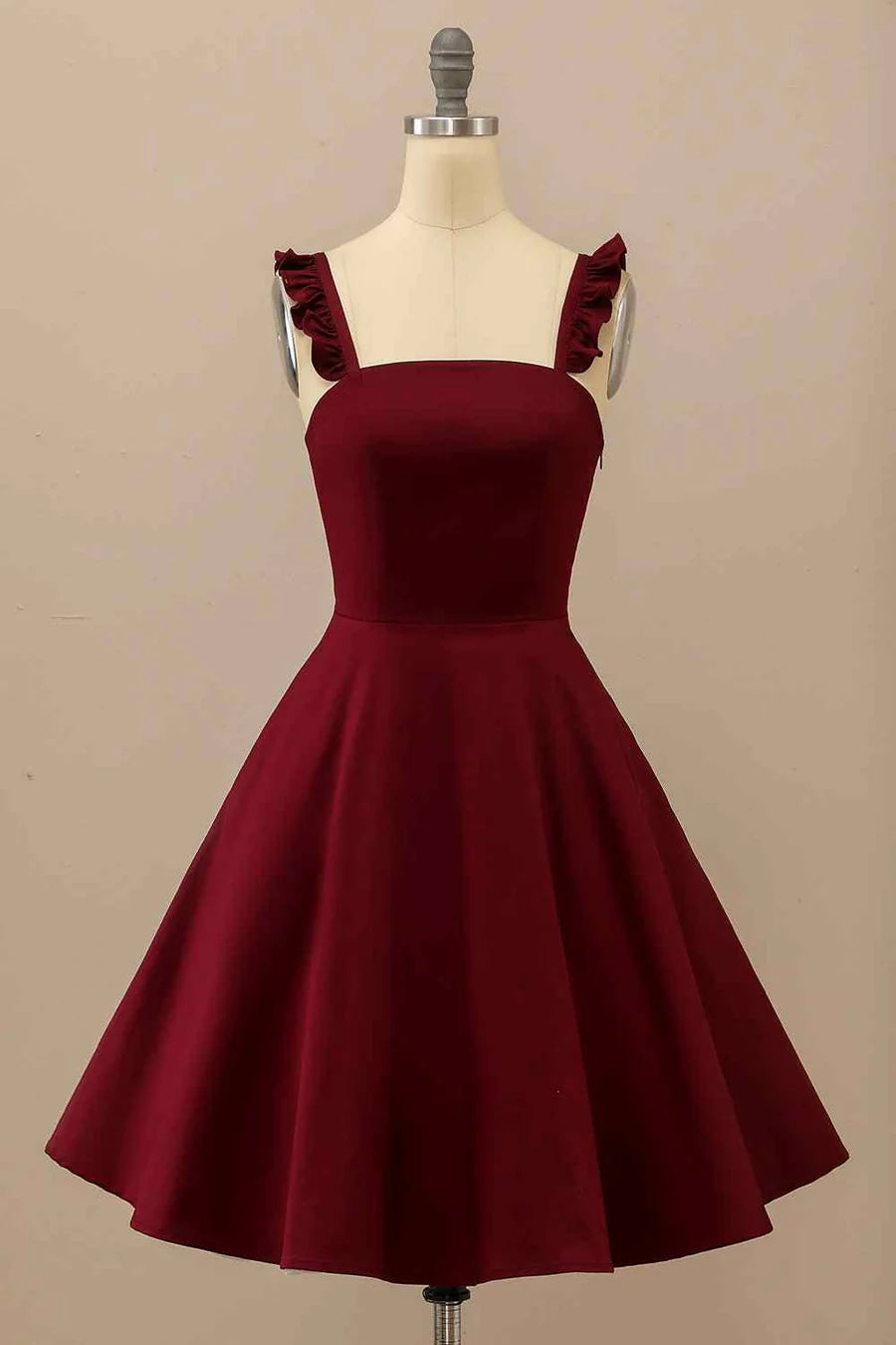 Elegant A-line satin mini homecoming dress with ruffle straps.