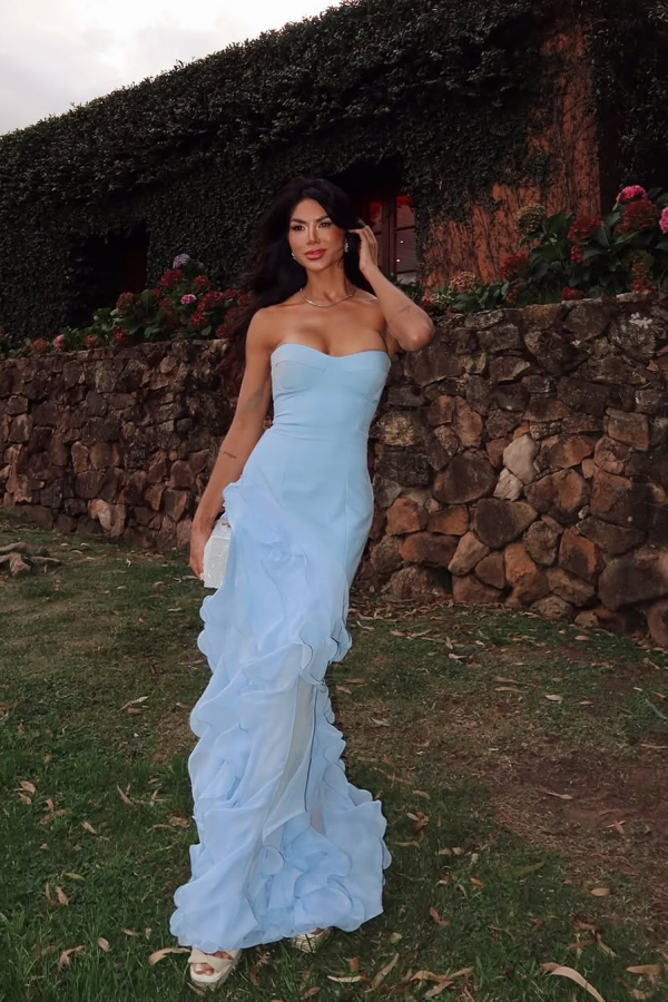 Elegant blue A-line prom dress with V-neck, satin chiffon, and ruffles.