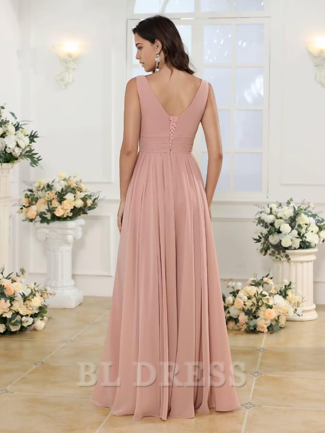 Close-up of the delicate chiffon fabric and ruffle details on the formal dress.