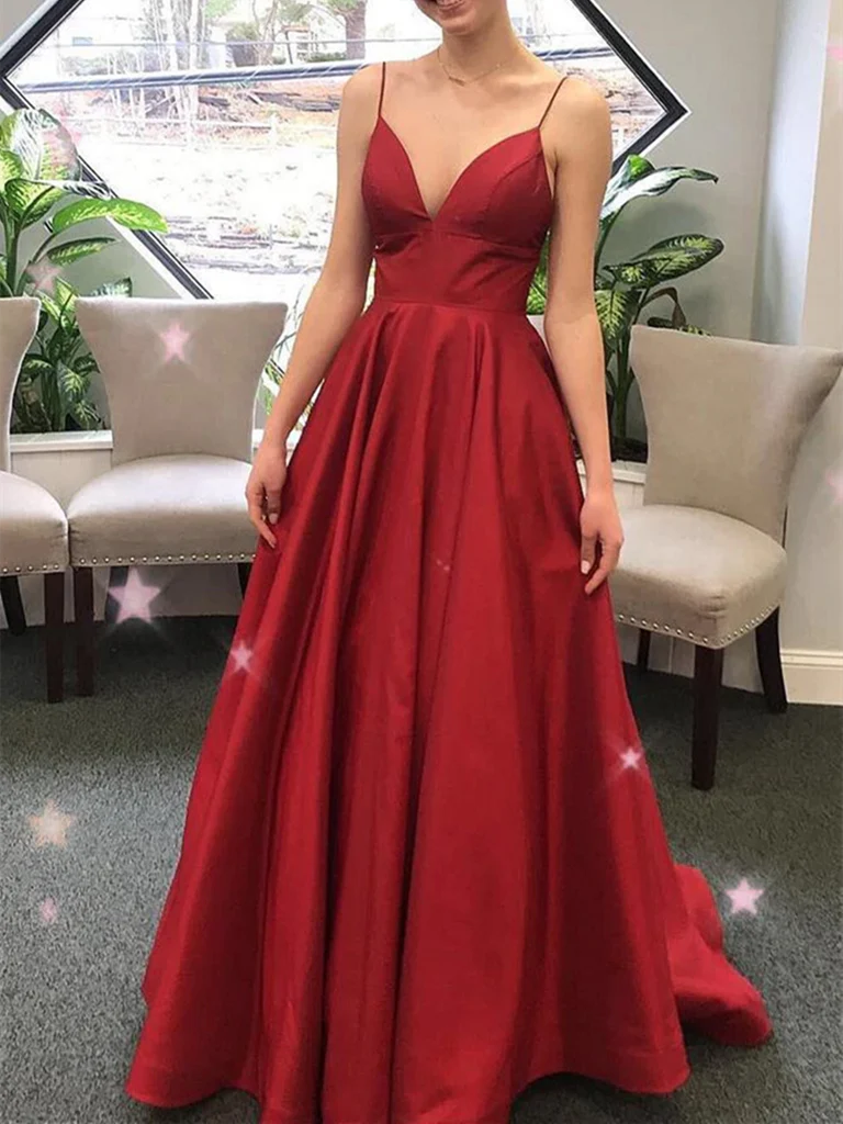 Woman wearing an elegant A-line V-neck satin long prom gown.