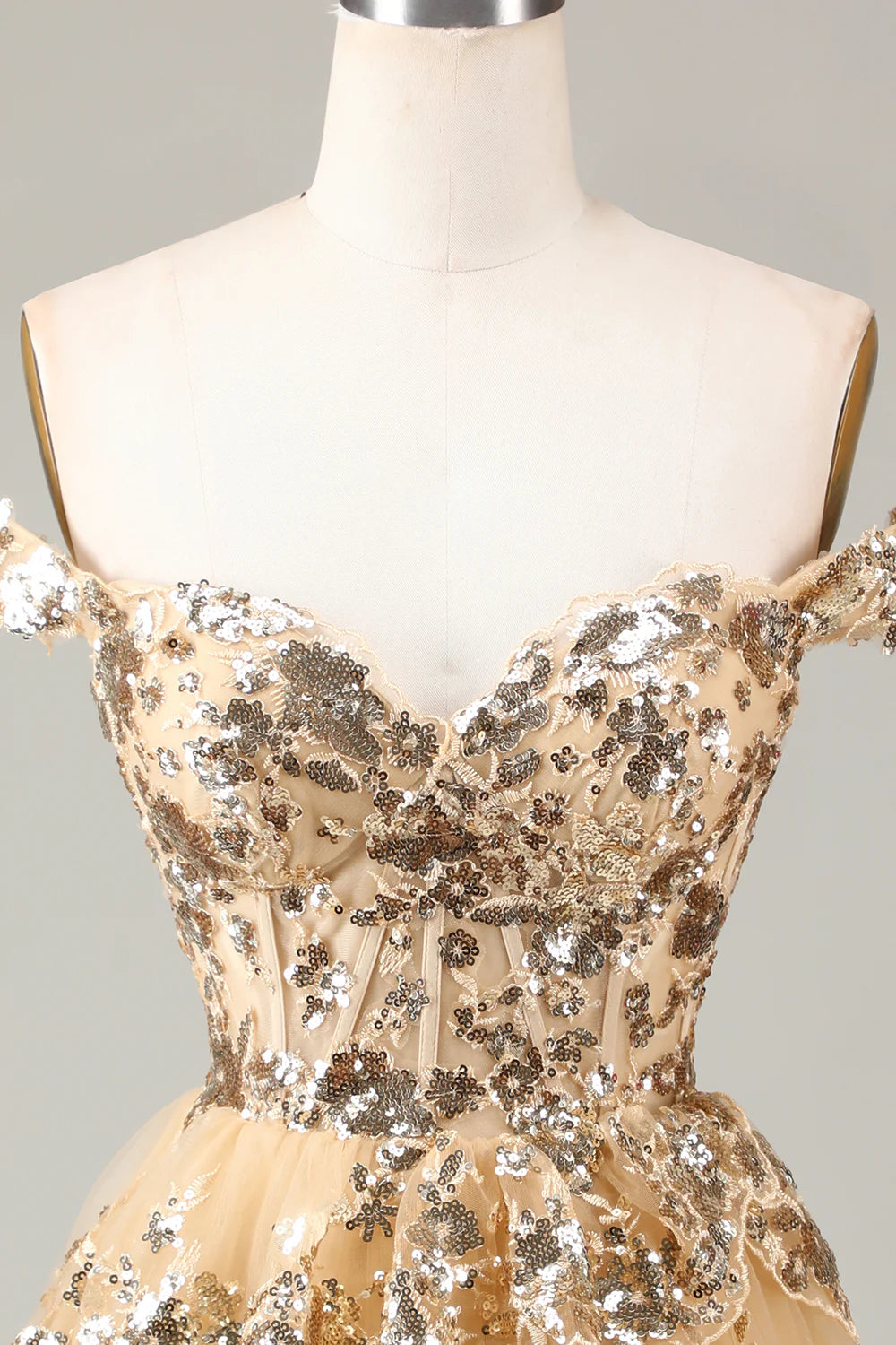 Close-up of lace and sequin detail on the A-line homecoming dress.