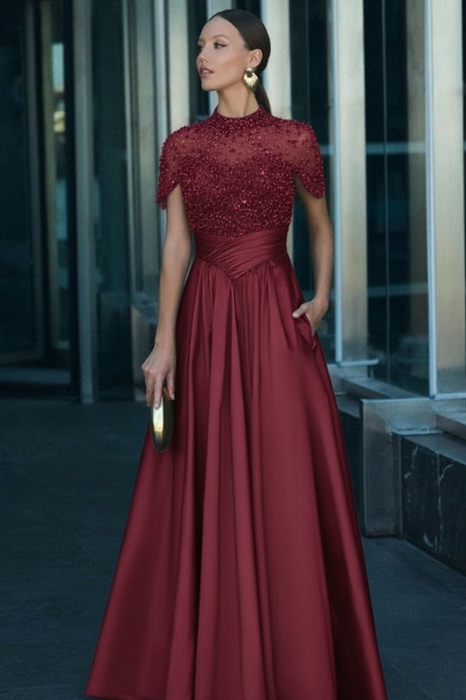 Full length view of the dark green satin dress, perfect for formal occasions.