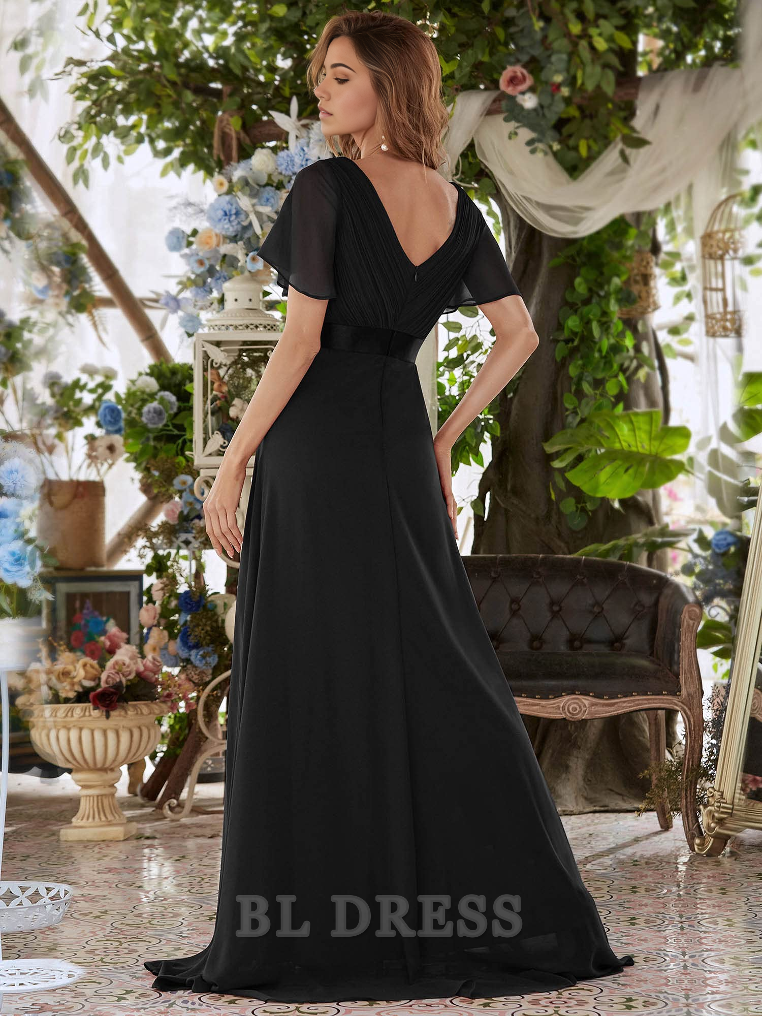 Floor-length A-line bridesmaid dress with V-neck.