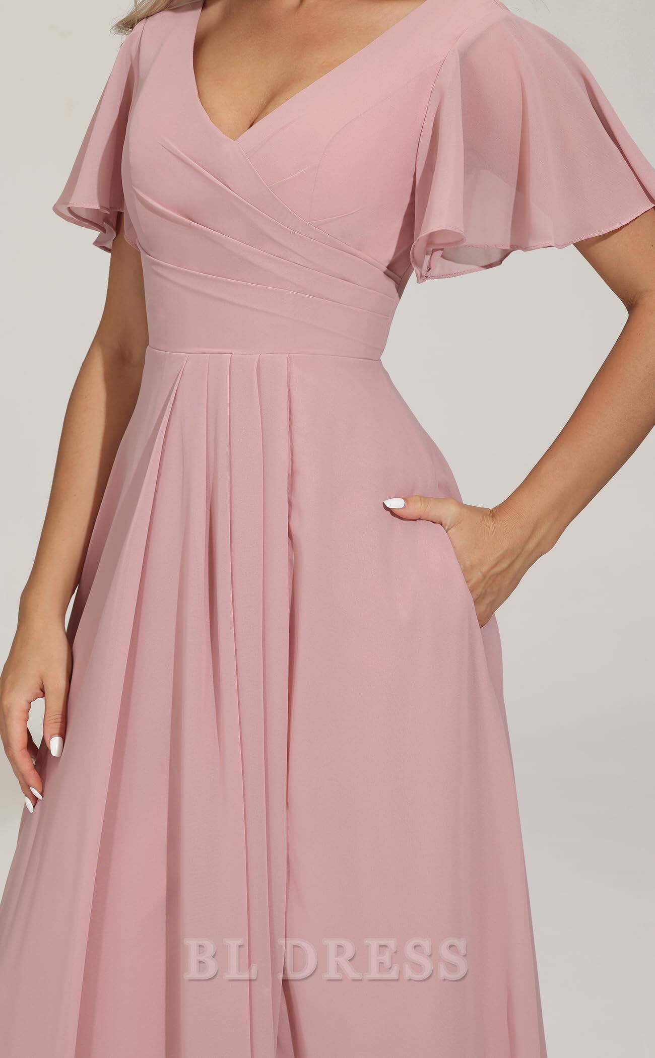 Side view of the A-line evening gown, highlighting the flowing chiffon and slit.