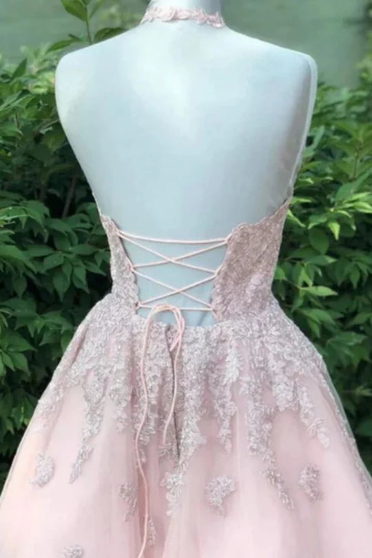 Back view of a short A-line homecoming dress featuring appliques.