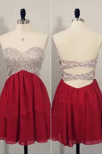 Elegant A-line short prom dress with V-neck, open back, and delicate beading.