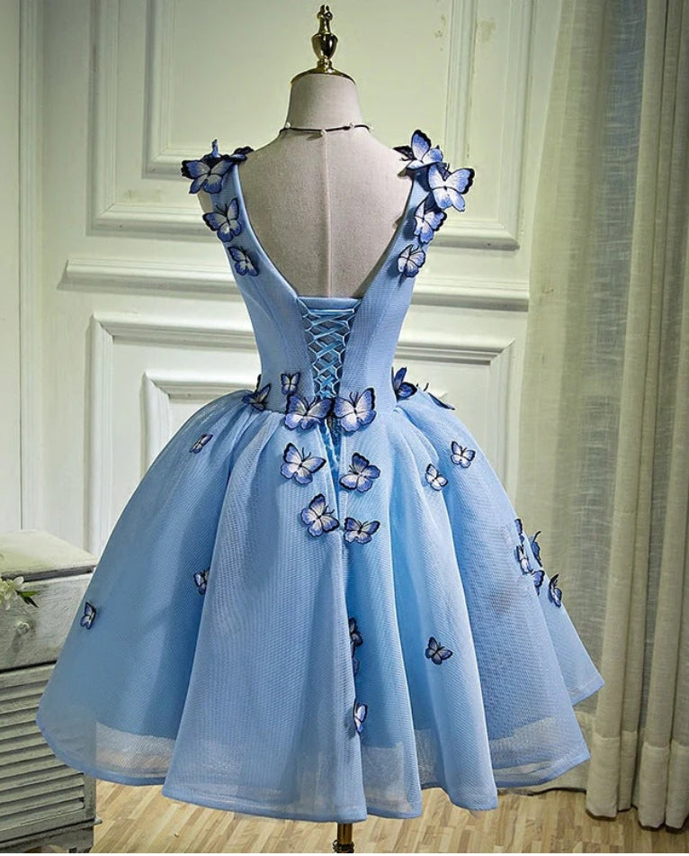 A-line V-neck short dress with floral tulle detail.