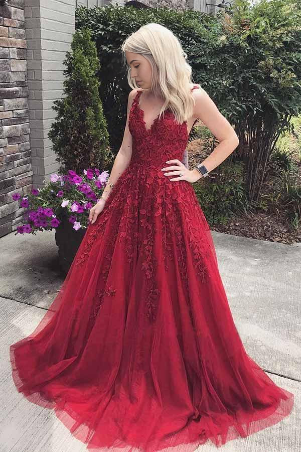 Burgundy A-line prom dress with V-neck and lace appliques.