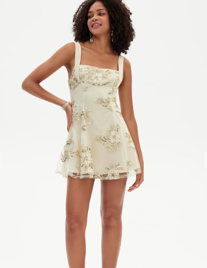 Elegant A-line V-neck mini dress with sequin and lace details.