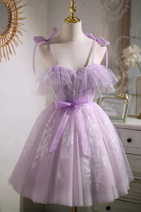 Back view of an elegant A-line short party dress.
