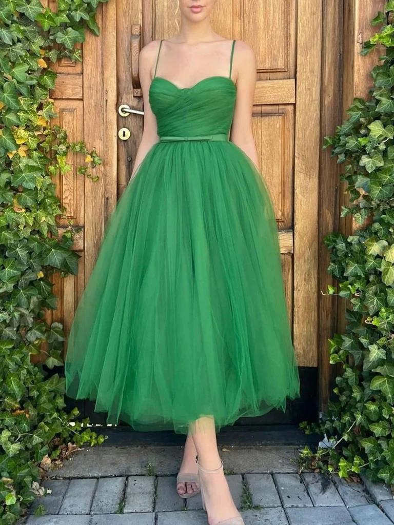 Full view of a sleeveless A-line tea length formal dress.
