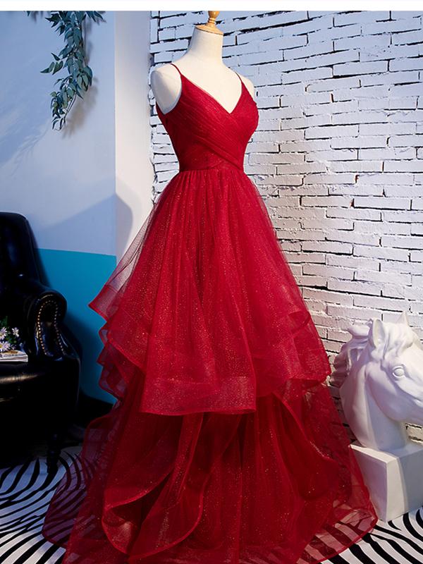 Close-up of the V-neckline on a wine red formal dress.