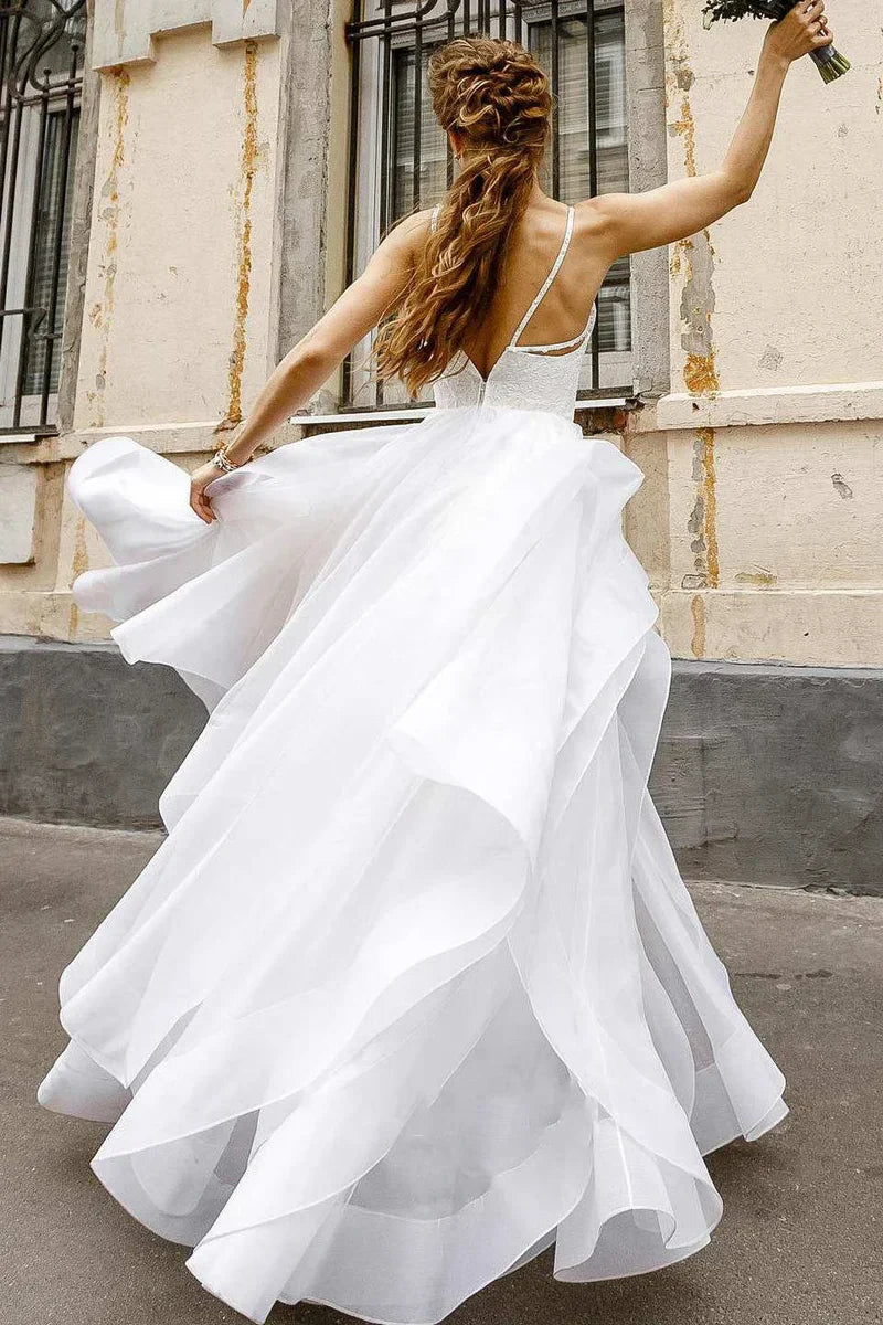 Flowy layered skirt of a bridal gown.