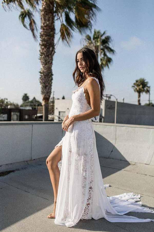 Elegant A-line white lace chiffon wedding dress with spaghetti straps.