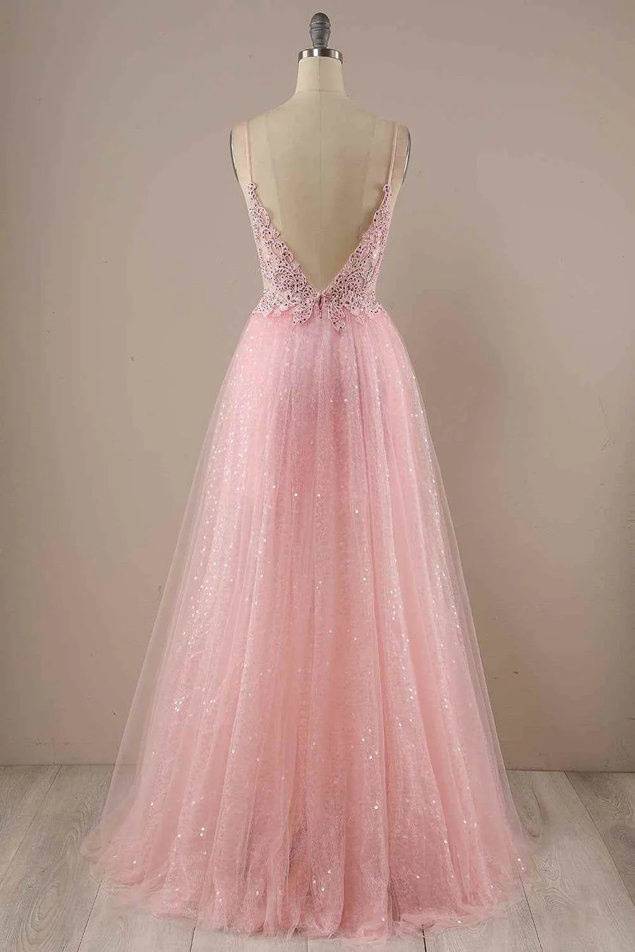 Back view of the A-line V-neck sparkly prom dress with flowing tulle.
