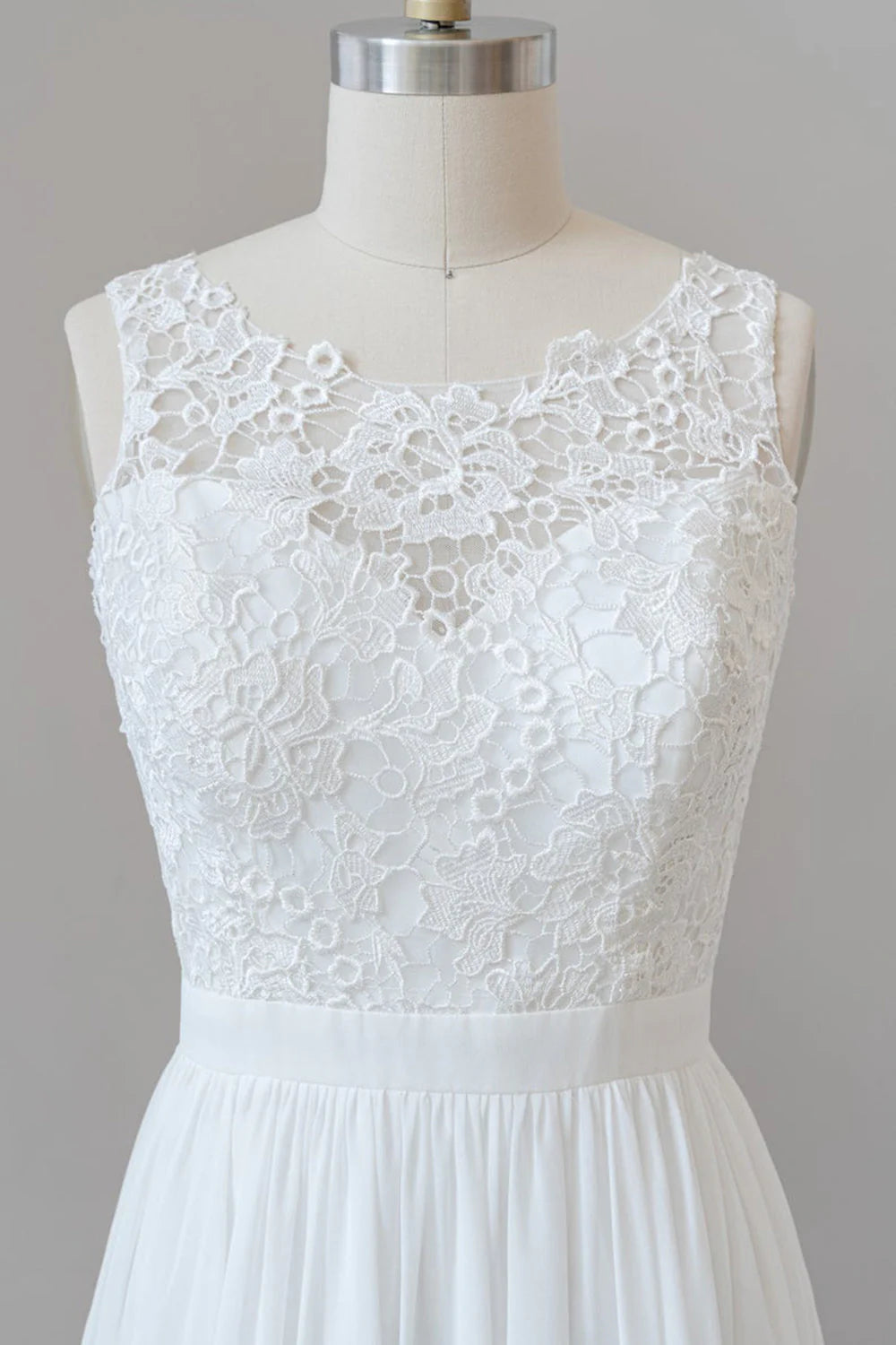 Close-up of the lace detail on an A-line wedding dress.