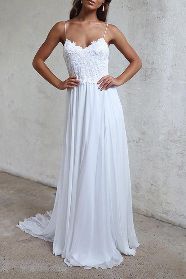 Elegant A-line white chiffon wedding dress with delicate straps.