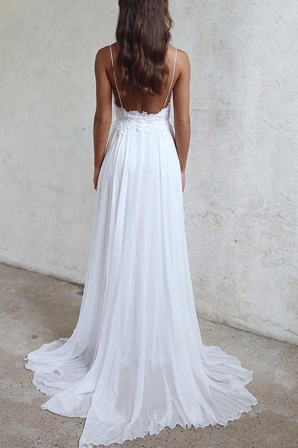 Long white chiffon beach wedding dress with A-line silhouette.