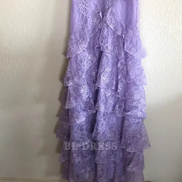 Back view of the lilac A-line dress, showcasing the backless design.